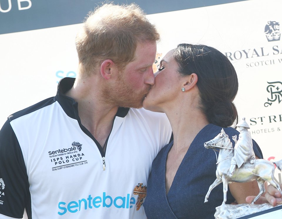  By sharing an intimate kiss where Charles and Diana were famously pictured looking frosty, Meghan and Harry prove that they are as in love as they were at their wedding