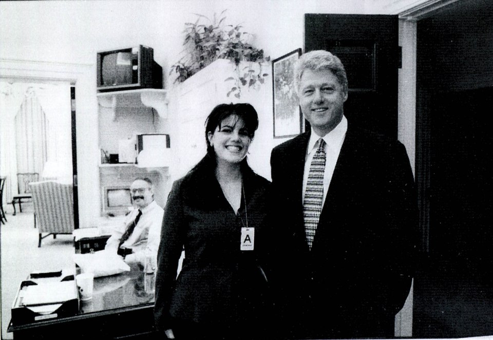  Monica Lewinsky, then a White House intern, is seen meeting Clinton at a function