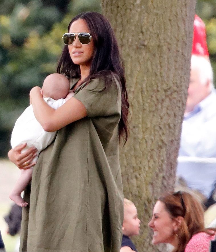  An insider described Meghan as a 'very hands-on mum' but says the new nanny is a 'godsend'