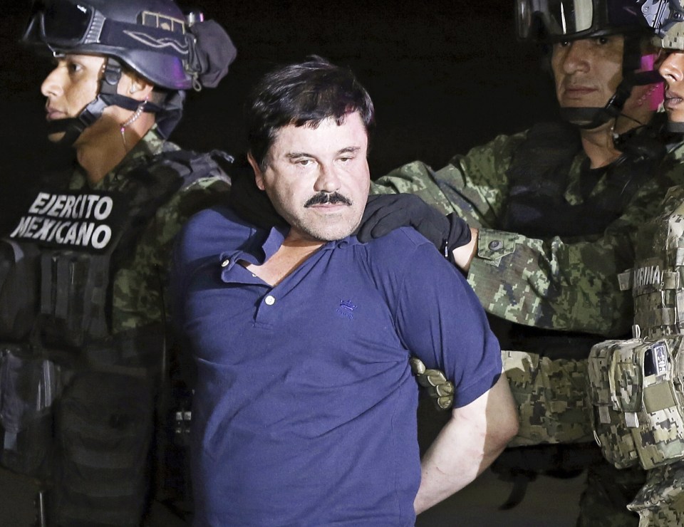  Mexican drug lord Joaquin 'El Chapo' Guzman escorted by authorities after his detention in Mexico City in May 2016