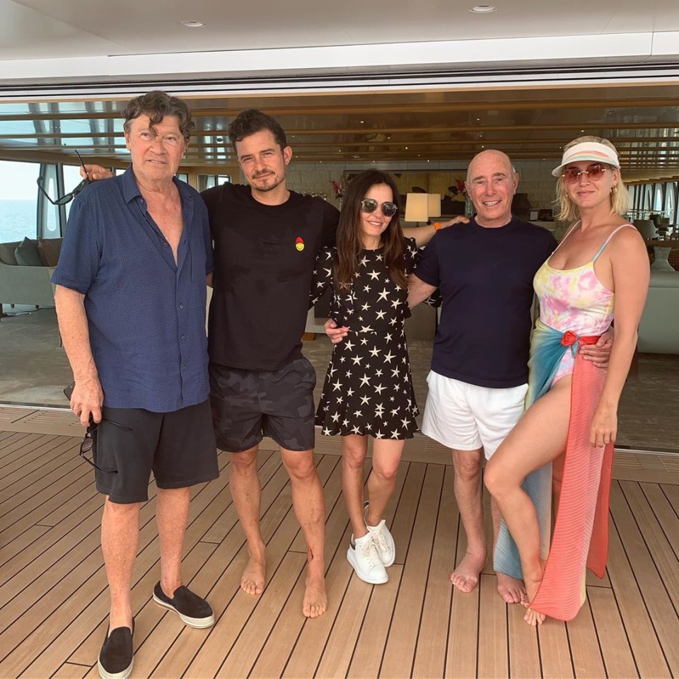  Katy and Orlando visited David Geffen's (second from right) luxury boat