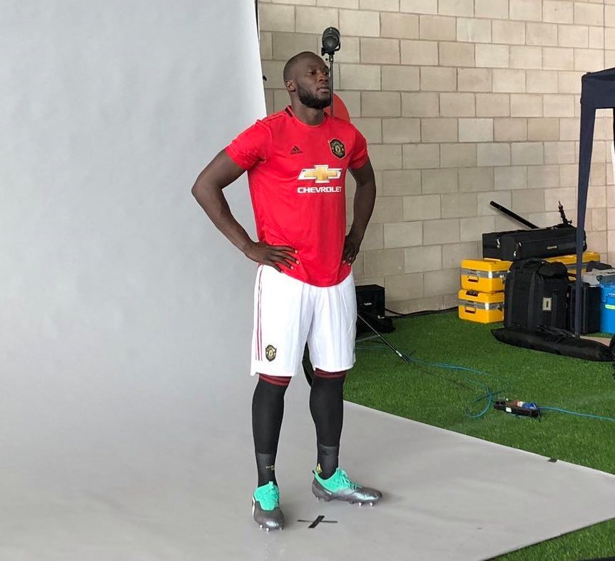  Romelu Lukaku didn't look delighted to be posing in his Manchester United kit