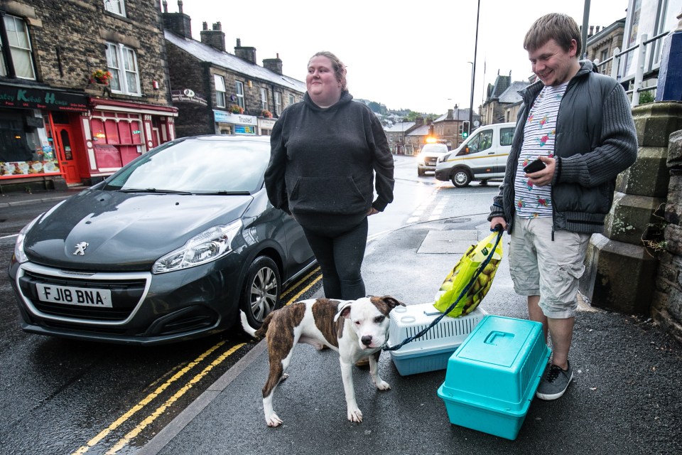  A young couple were evacuated with their pets in the town of Whaley Bridge