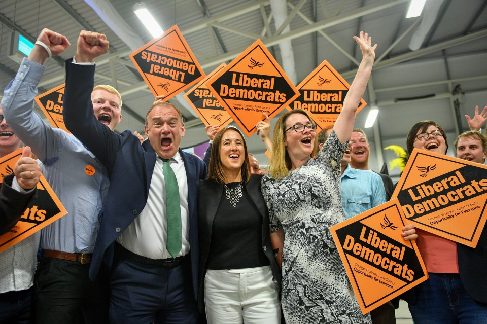 Jubilant Lib Dems celebrate the victory in the Brecon and Radnorshire by-election – ousting the Tory incumbent