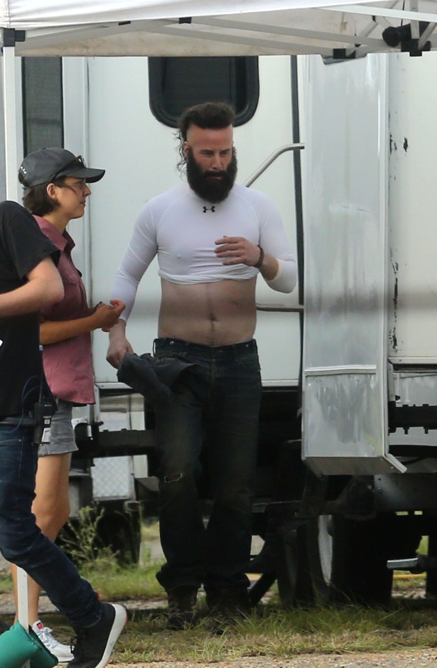  The usually handsome actor wore a white crop top and jeans