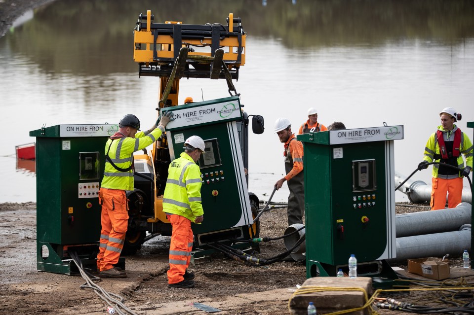  Pumping equipment is brought in by the reservoir in Whaley Bridge