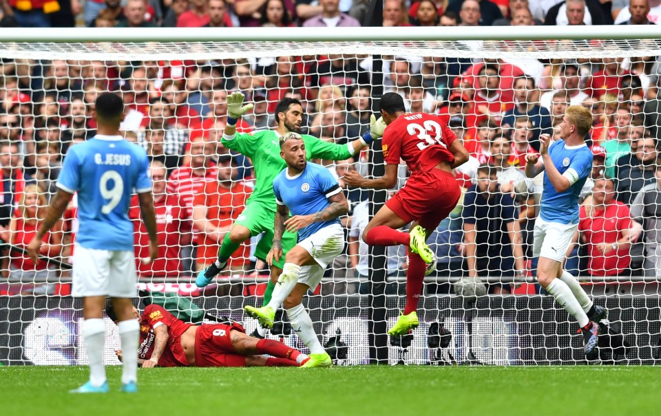  Joel Matip heads in the equaliser late in the second half