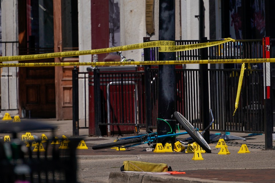  Evidence markers rest on the ground after the mass shooting in Dayton, Ohio