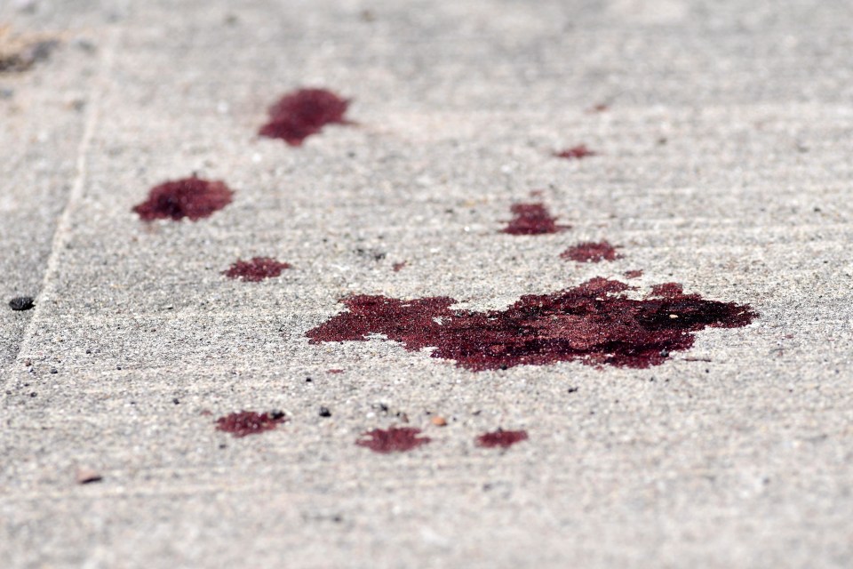  Blood splatter near the scene of the shooting in the Oregon district of Dayton