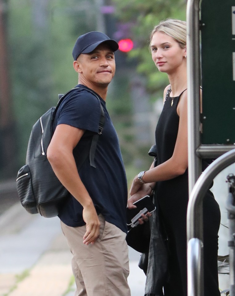  Sanchez and his partner were snapped waiting patiently on the platform