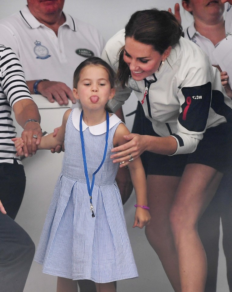  Princess Charlotte stuck her tongue out at grandfather Michael Middleton after Kate spotted him in the crowds