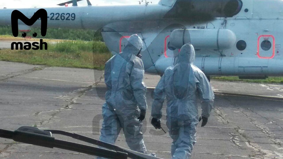 Paramedics were spotted wearing special chemical protection suits when they treated the victims