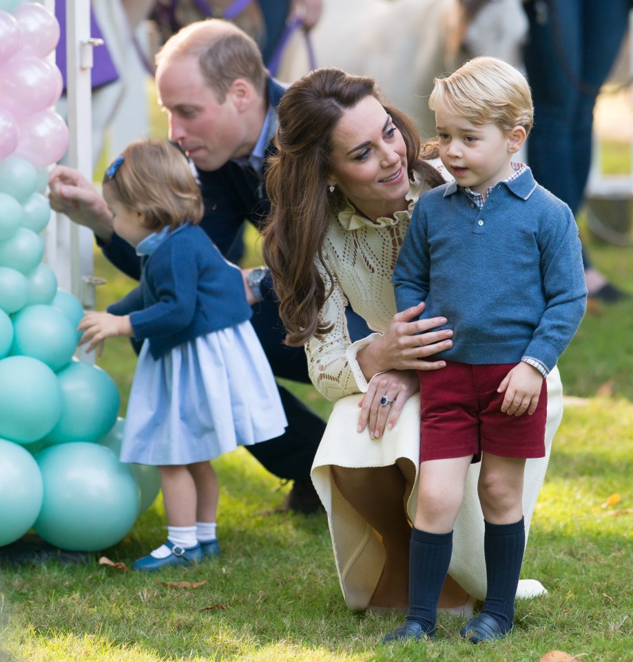  Kate and Prince George are pictured during a children’s party for military families while on their royal tour of Canada in September 2016