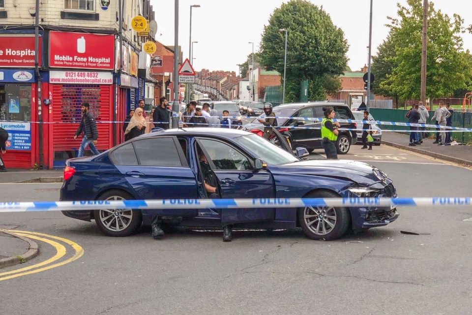  The smashed police car was left in the middle of the road