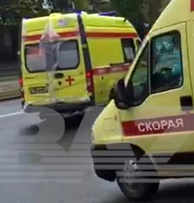  Ambulances at the scene of Thursday's blast appears to show the vehicles wrapped in protective film