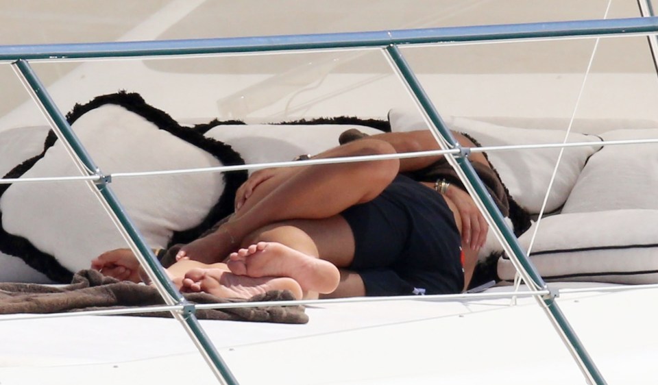  Chloe cuddles her new man on the yacht's deck after splitting from Jeremy Meeks