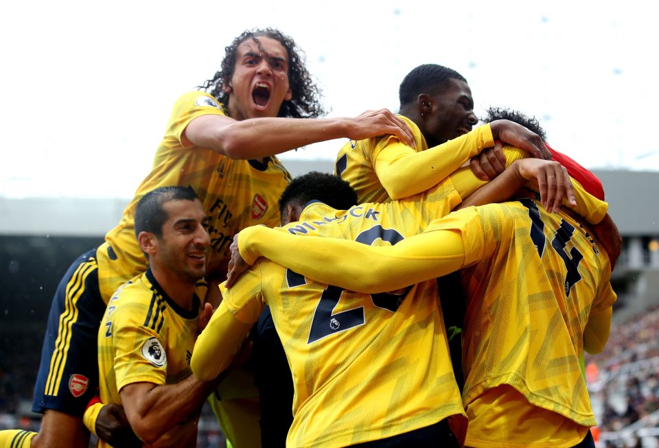  Arsenal sported their bright yellow second kit on the opening day of the Premier League season