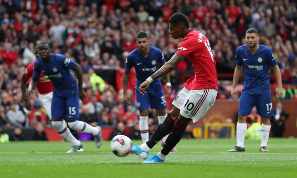  Marcus Rashford coolly slots home the first-half penalty breakthrough for Man Utd against Chelsea