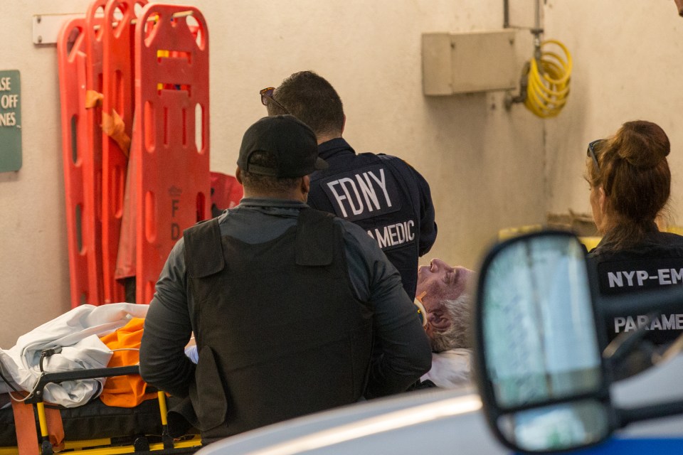  The body of Jeffrey Epstein is wheeled into a hospital in New York after he was found unresponsive in his jail cell