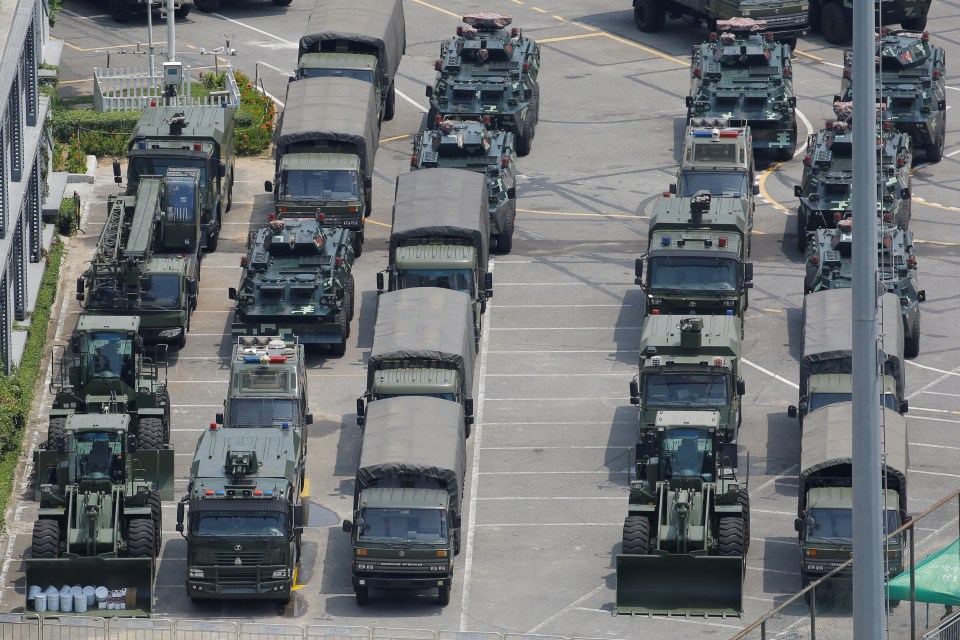  Armoured vehicles are spotted parked in the dozens outside the sport's stadium