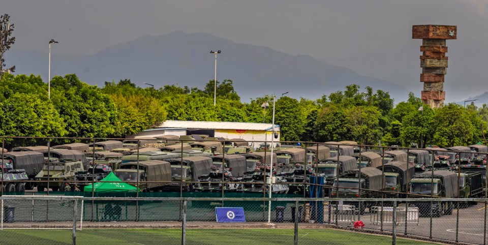  People's Armed Police Force (PAP) vehicles are seen gathered on the Shenzhen Bay