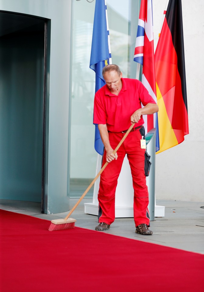  The red carpet being rolled out as Boris arrived in Berlin