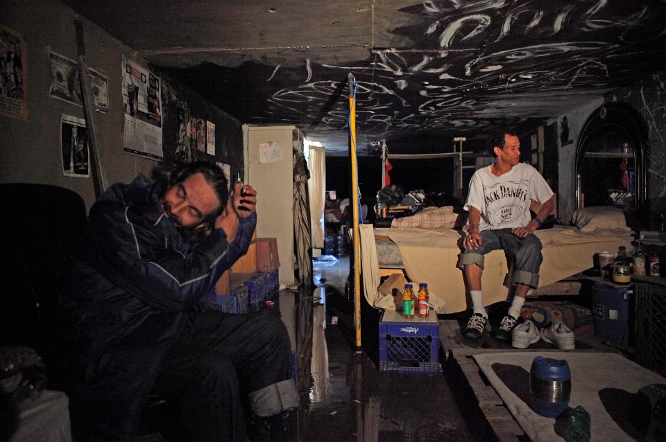  Homeless people eat scraps off the floor and build make-shift bedrooms