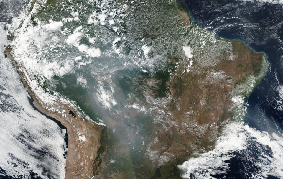  A Nasa satellite image shows the huge amount of smoke caused by the rainforest fires across Brazil and the Amazon basin