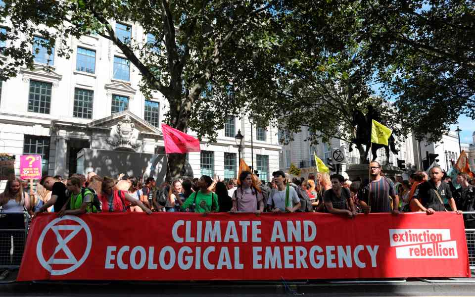  Climate change activists from Extinction Rebellion protest outside the Brazilian embassy in London