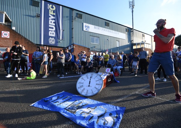 Bury are sweating on an EFL decision whether to give the club time to complete a takeover or be expelled from the league