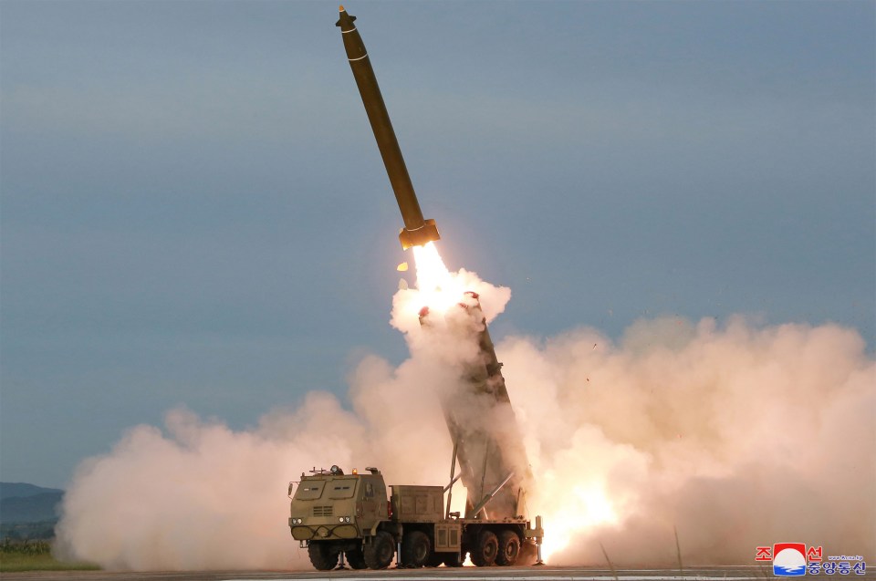  Test-firing of a 'newly developed super-large multiple rocket launcher', at an undisclosed location