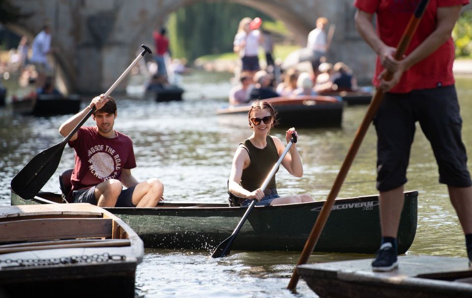  This couple enjoys a cheeky little punt along the river Cam in Cambridge