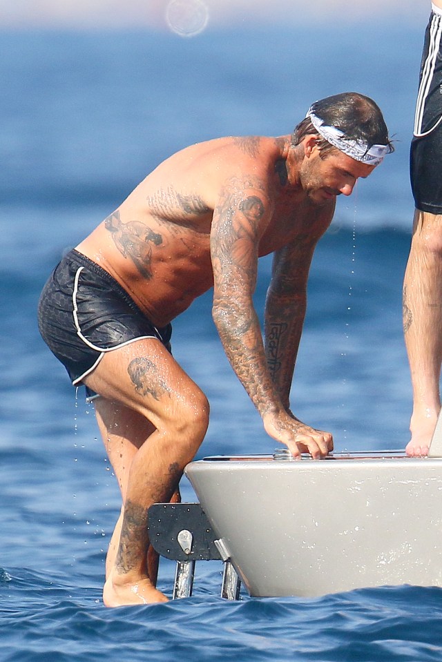  Becks showed off his tattoos as he climbed aboard