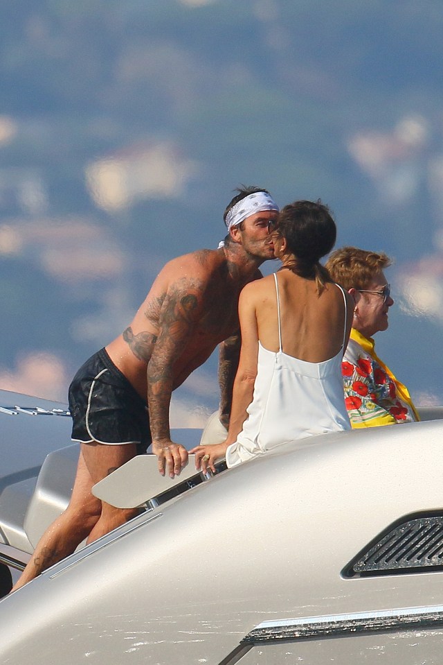  David Beckham gave wife Victoria an affectionate kiss on the lips aboard Elton John's luxury yacht