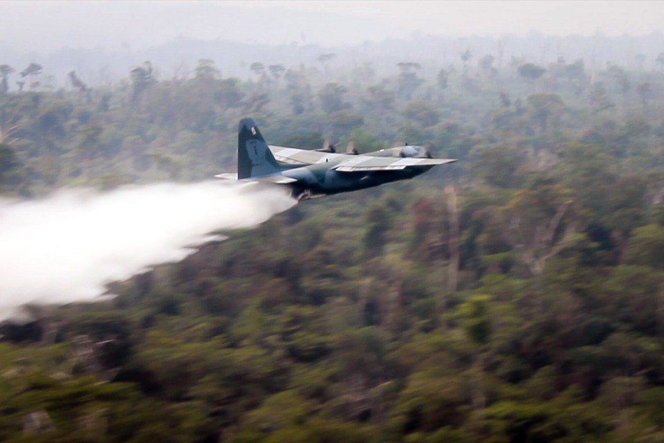  A Hercules C-130 plane from Brazil's Air Force dropping water to fight the fire at the Amazon forest