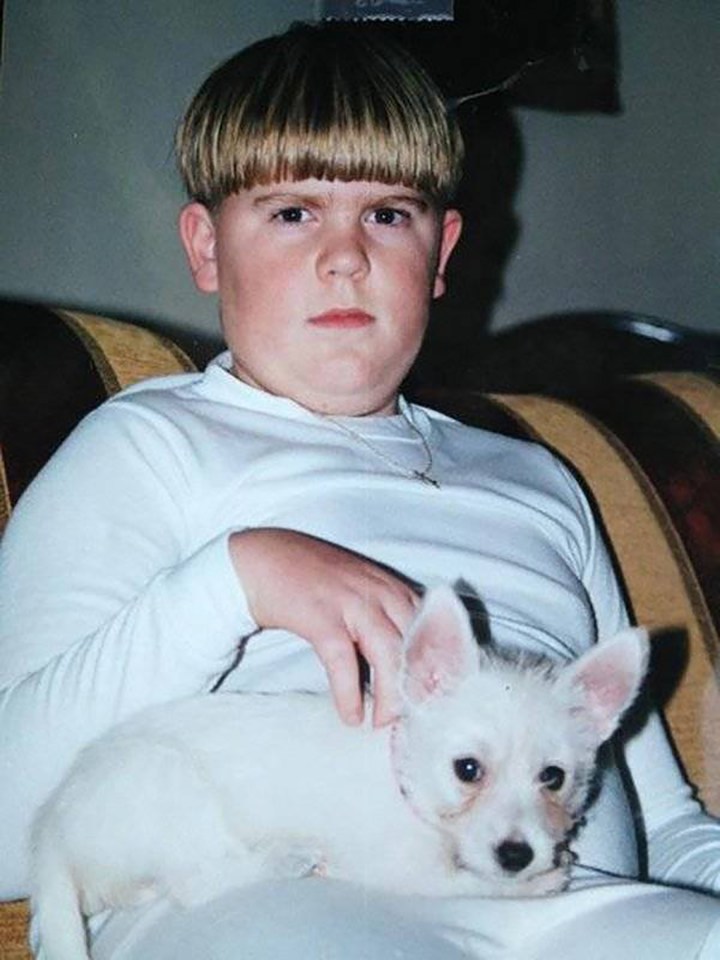  This young boy flaunts his signature bowl-cut look