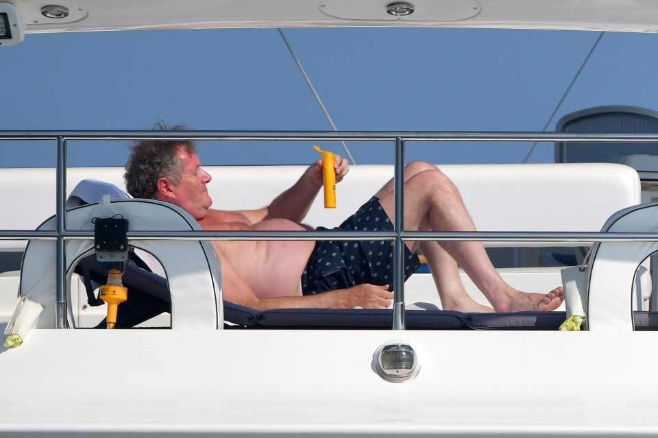  The Good Morning Britain host looked unbothered while applying sun cream on a yacht in St Tropez