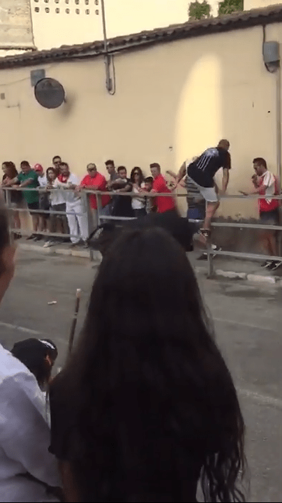  The man tries to make an escape by jumping over the railing