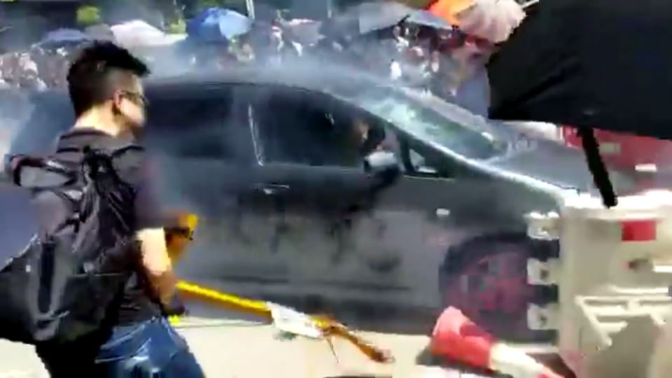  The car hit protesters in the Yuen Long area of the city