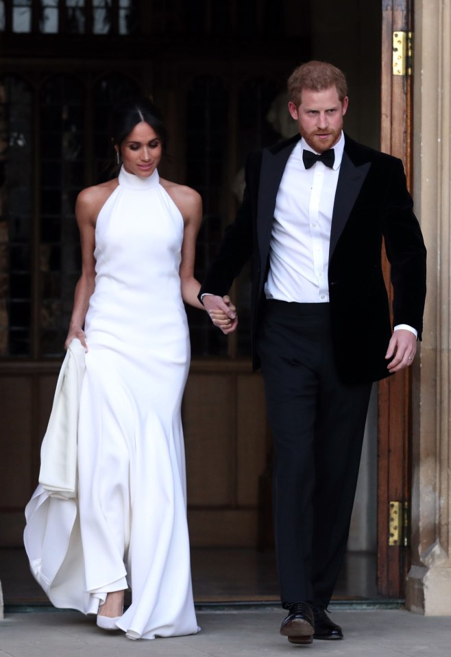 Meghan wore a silk halterneck dress by Stella McCartney for the evening