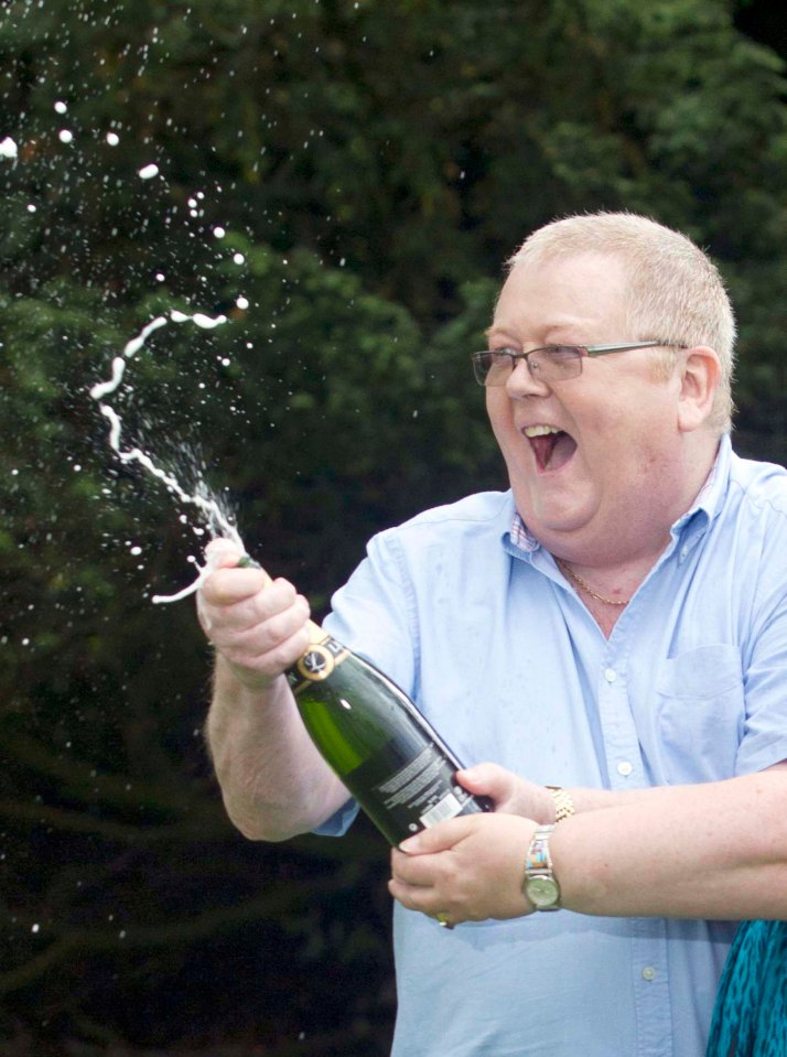  Colin Weir cracks a bottle of fizz after record-breaking jackpot win