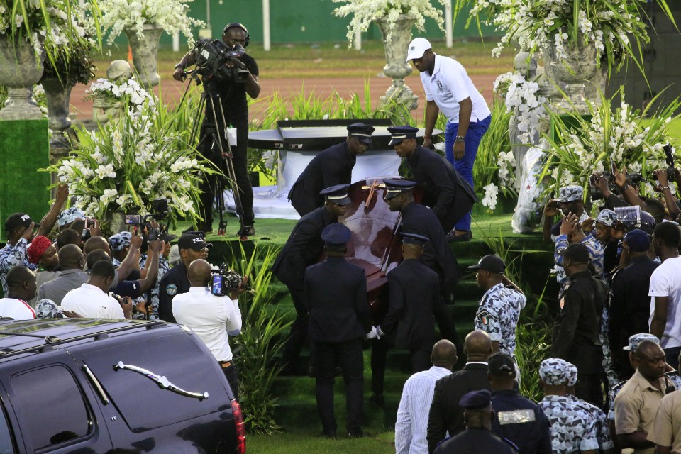  DJ Arafat's coffin is carried into Felix Houphouet-Boigny stadium earlier in the day