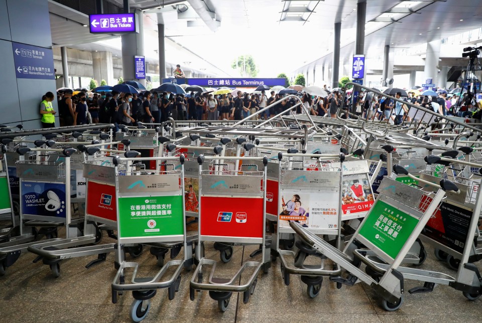  Protesters erected barricades and overturned trolleys at the airport