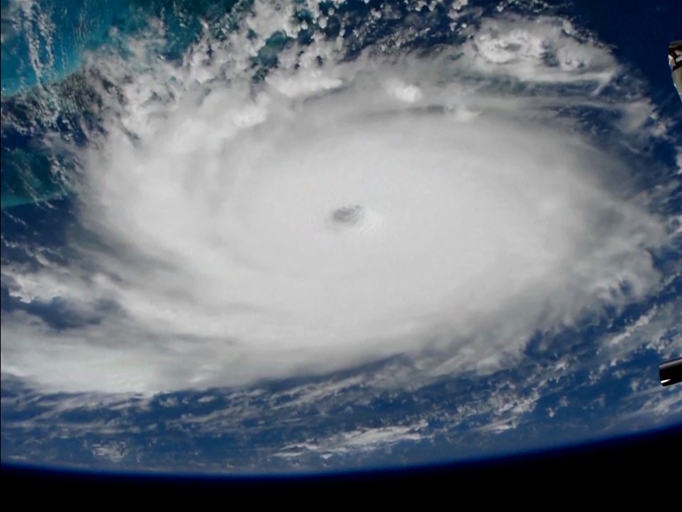  The eye is the tiny gap in the centre, seen from above in this satellite pic