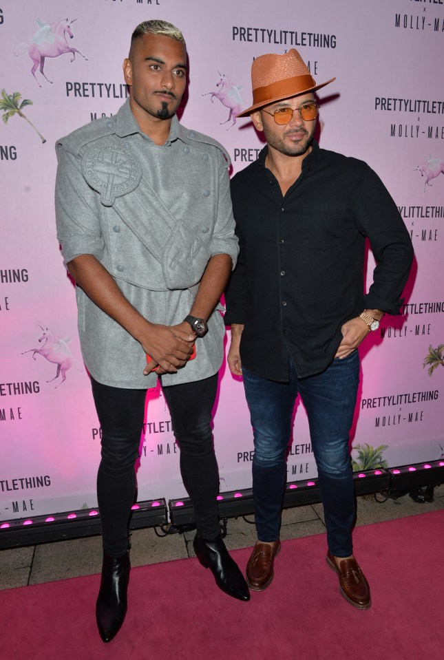  Dad-to-be Ryan looked dapper beside PrettyLittleThing co-founder Umar Kamanie (left) on the pink carpet