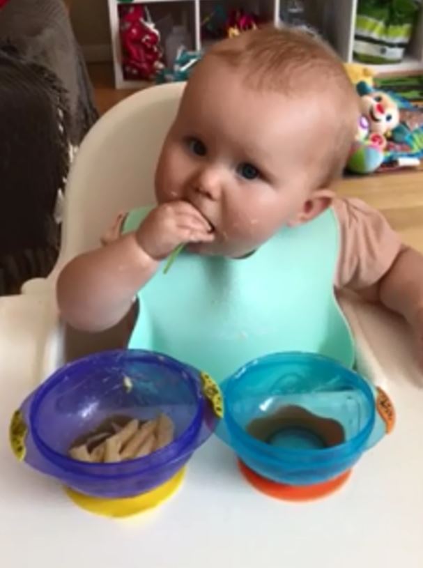  A mum has captured the moment her daughter tried spinach for the first time on camera