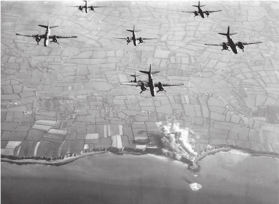  A-20s striking the German strongpoint at Pointe du Hoc on the Normandy coast in May 1944