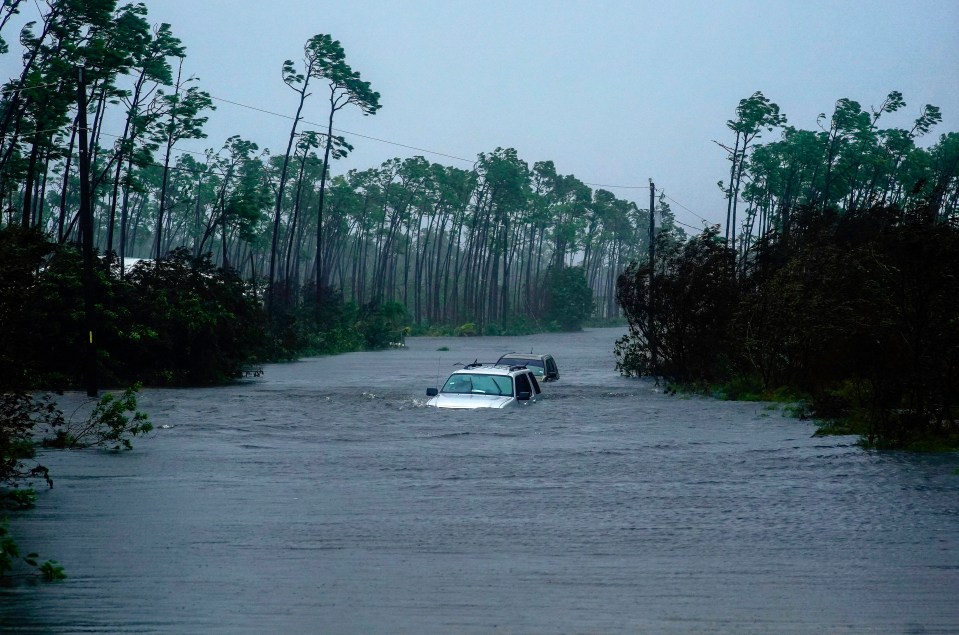  A car is submerged in water from Hurricane Dorian in Freeport, Bahamas