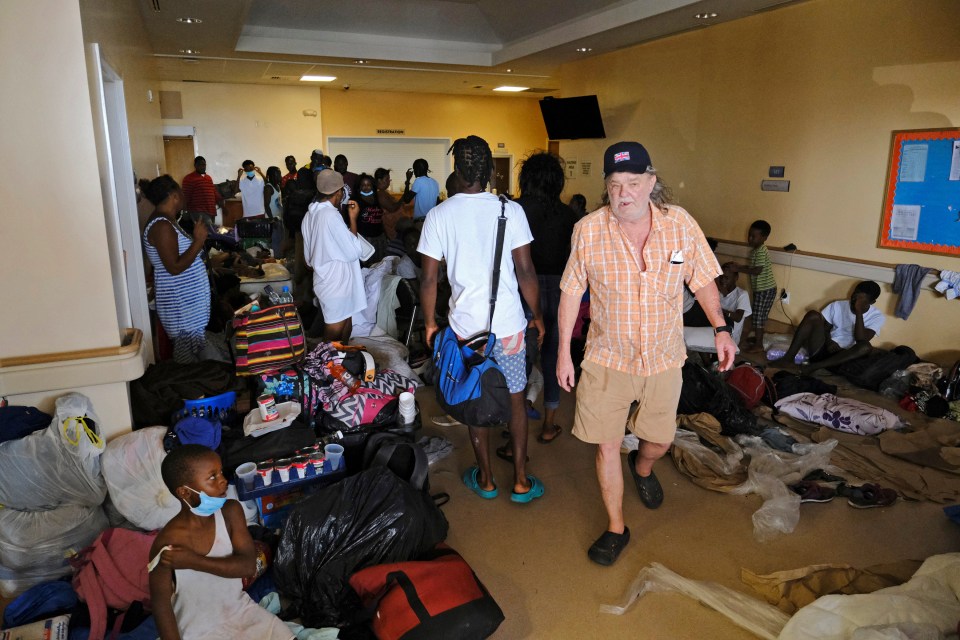  A man searches for his wife in the Marsh Harbour Medical Clinic in the aftermath of Hurricane Dorian