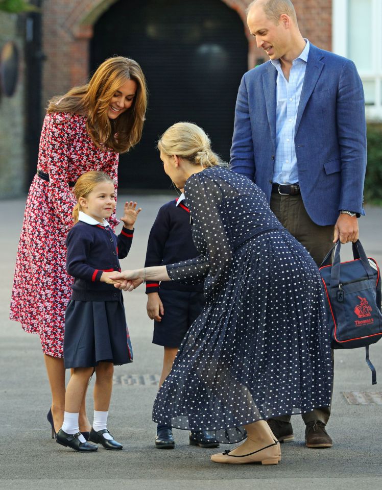  Charlotte shakes hands with head of the lower school Helen Haslem